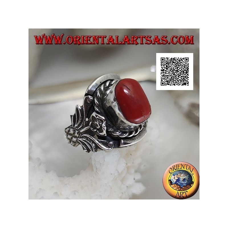Silver ring with oval Tibetan antique coral with interweaving and integral flower on the sides