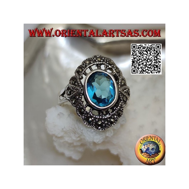 Silberner Wolkenring mit ovalem Blautopas und Markasit