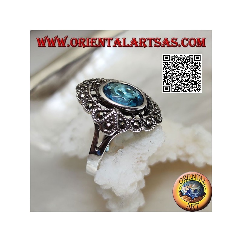 Silberner Wolkenring mit ovalem Blautopas und Markasit