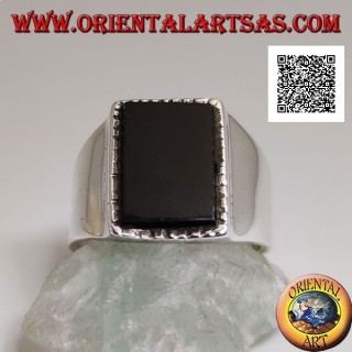 Silver ring with raised rectangular onyx with slightly striped edge on a smooth frame