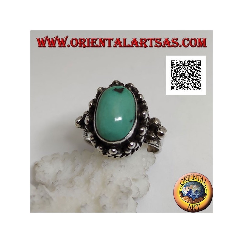 Silver ring with antique oval Tibetan turquoise surrounded by trio of balls and intertwining (16)