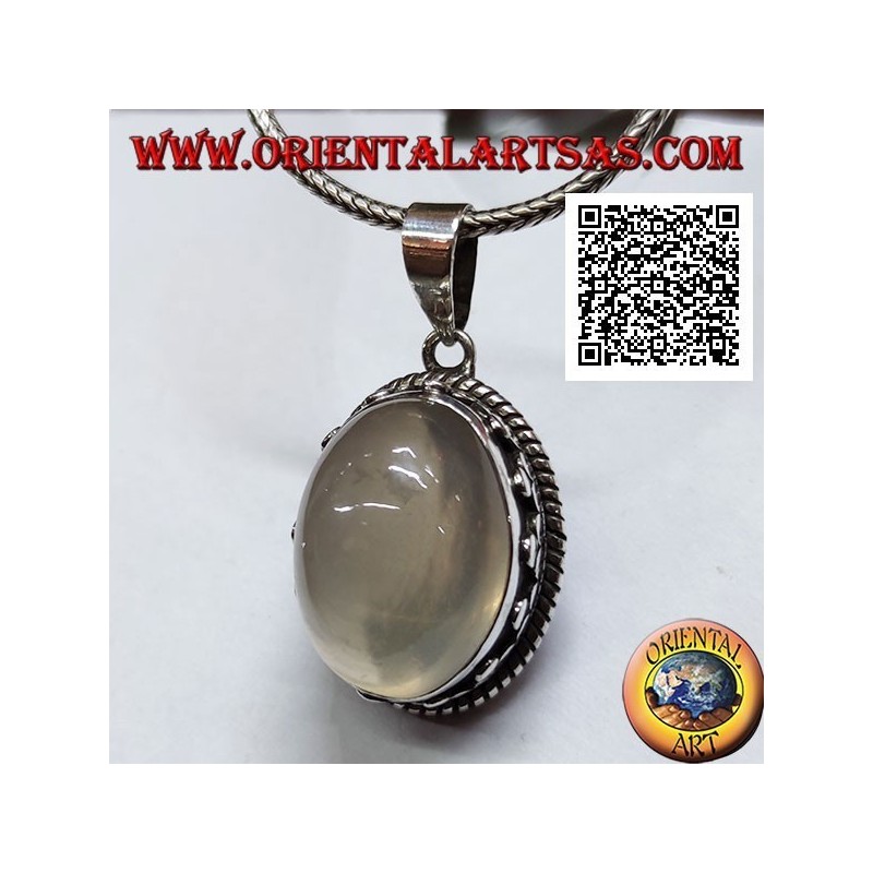 Silver pendant with cabochon oval moonstone surrounded by interlacing and trio of discs