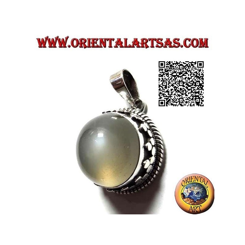 Silver pendant with round cabochon moonstone surrounded by interlacing and trio of discs
