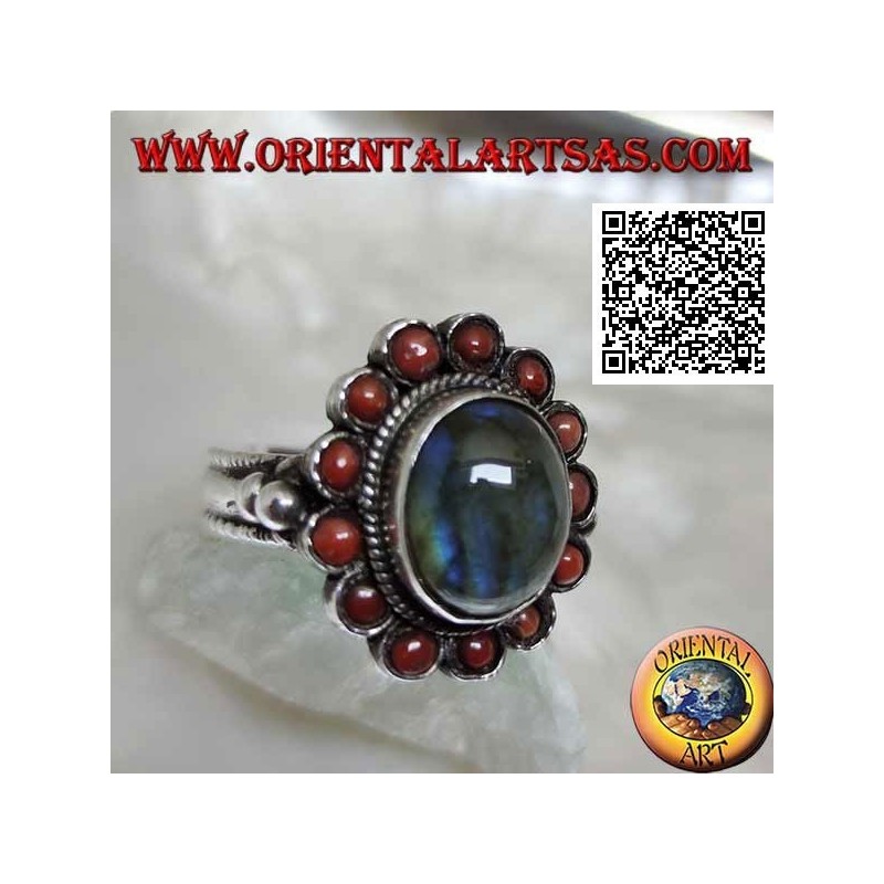 Silver flower ring with oval cabochon labradorite surrounded by Tibetan corals