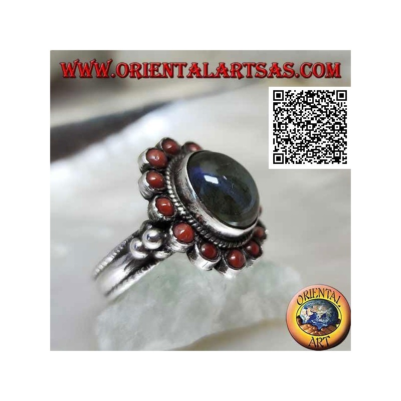 Silver flower ring with oval cabochon labradorite surrounded by Tibetan corals