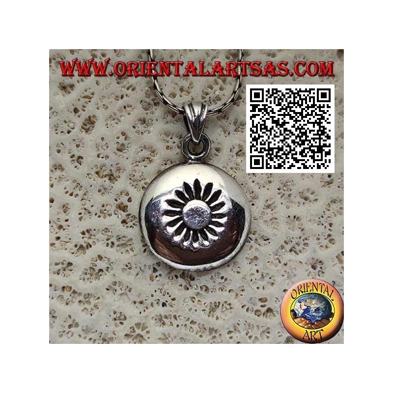 Silver pendant, rounded rounded medal with sun engraved in the center