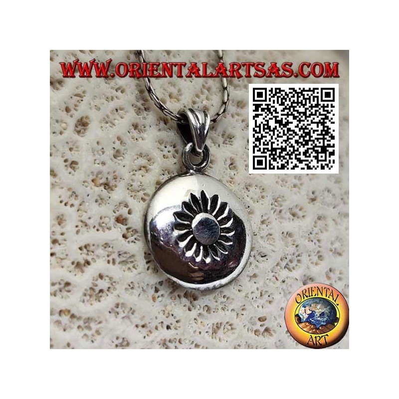 Silver pendant, rounded rounded medal with sun engraved in the center