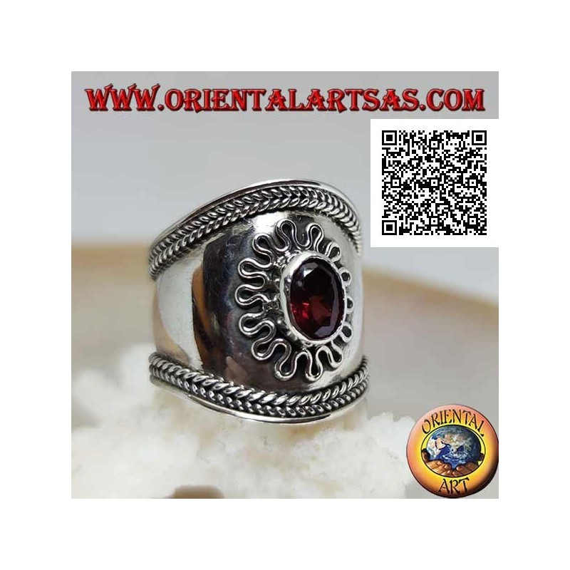 Anillo de plata de banda ancha con granate ovalado rodeado de serpentina y entrelazado en los lados, Bali (tamaño libre)
