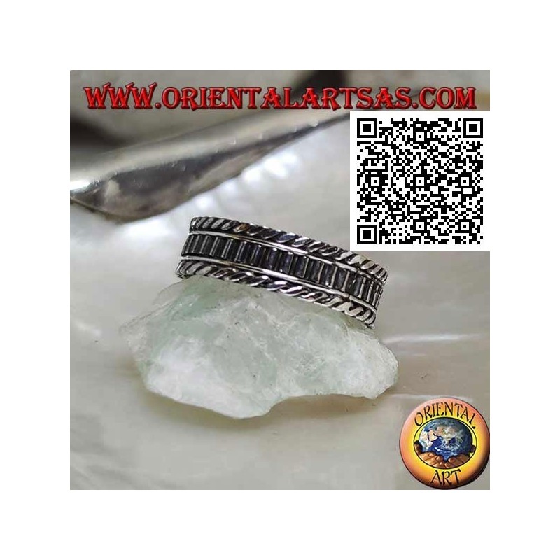 Silver ring with vertical segments between rolled cords
