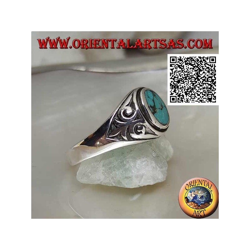 Anello in argento con turchese naturale ovale con giglio imperiale in bassorilievo sui lati