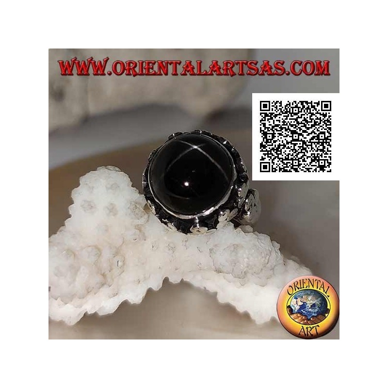 Silver ring with a round cabochon-shaped Black Star on a high-edged frame with trio of discs