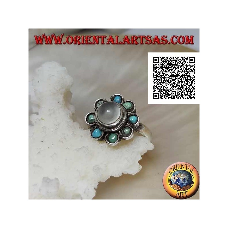 Daisy silver ring with a round cabochon moonstone surrounded by turquoise