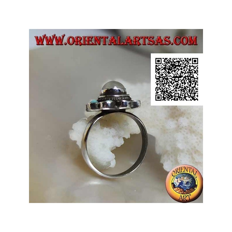 Anillo de plata margarita con piedra de luna redonda cabujón rodeada de turquesa