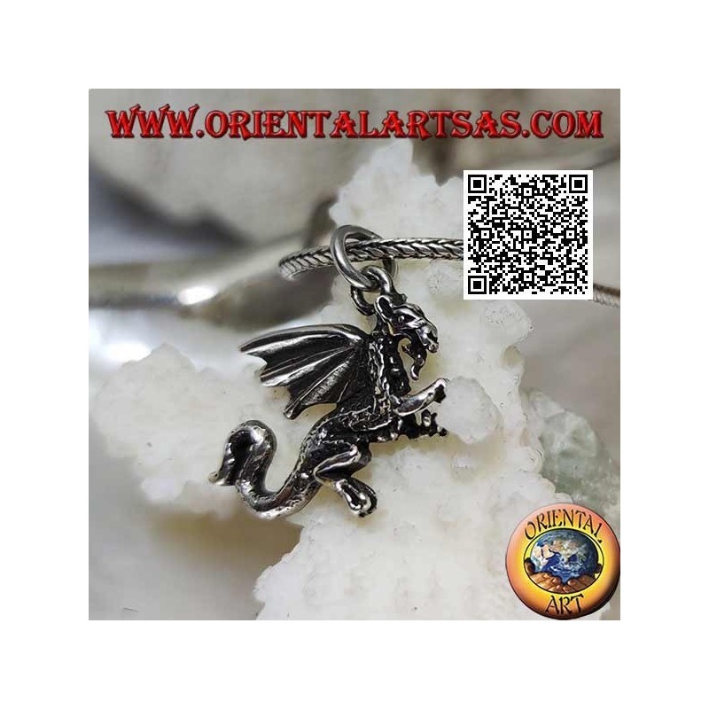 Silver pendant in the shape of a western dragon standing on two legs