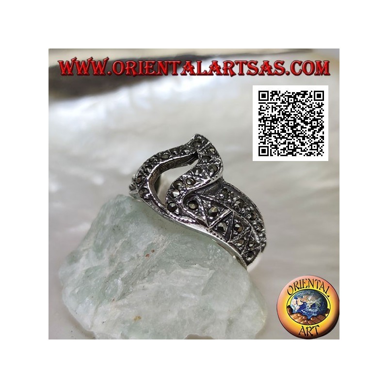 Bague en argent avec flamme centrale percée parsemée de marcassite