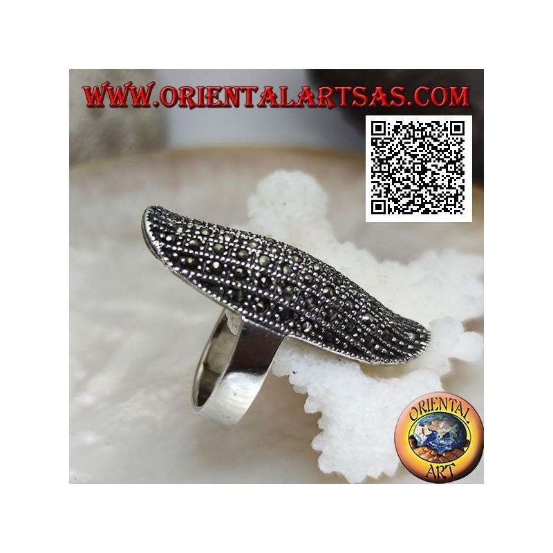 Silver ring in a large elliptical shape with a rounded center studded with marcasite