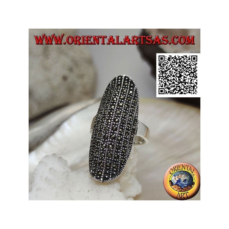 Silver ring in a large elliptical shape with a rounded center studded with marcasite