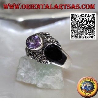 Silver ring with oval natural amethyst on a cross studded with marcasite and onyx on the sides