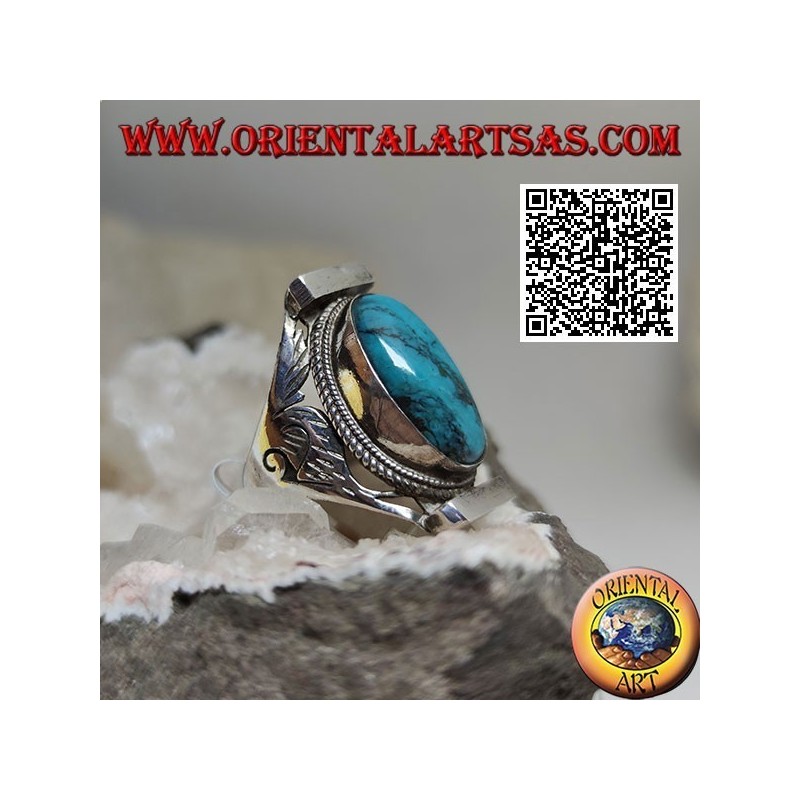 Bague en argent avec turquoise ovale entourée d'entrelacs sur monture népalaise et gravures sur les côtés