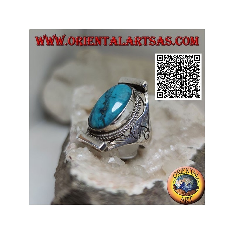 Bague en argent avec turquoise ovale entourée d'entrelacs sur monture népalaise et gravures sur les côtés