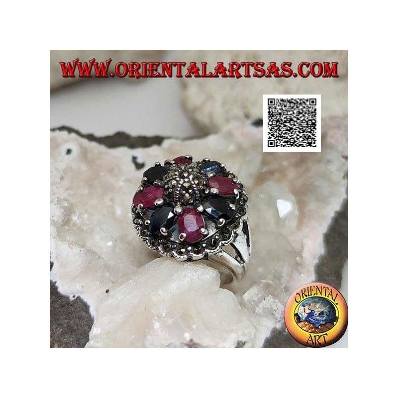 Silver ring with natural oval rubies and sapphires set with central maracssite on dome and around