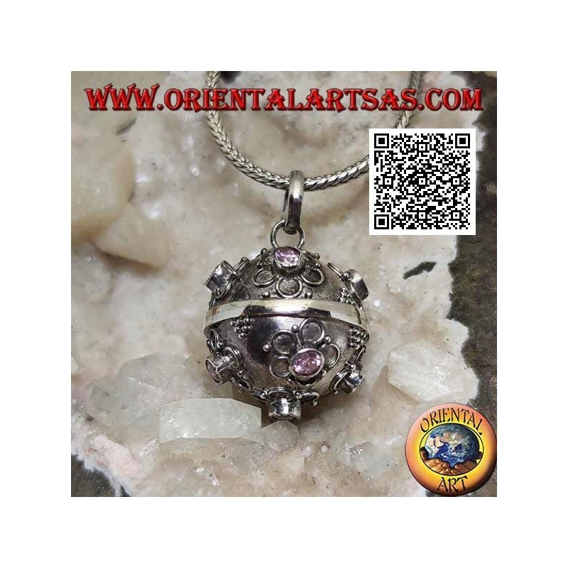 Silver pendant "Call of the Angels" with small flowers in relief and central pink zircon (Ø 20mm.)
