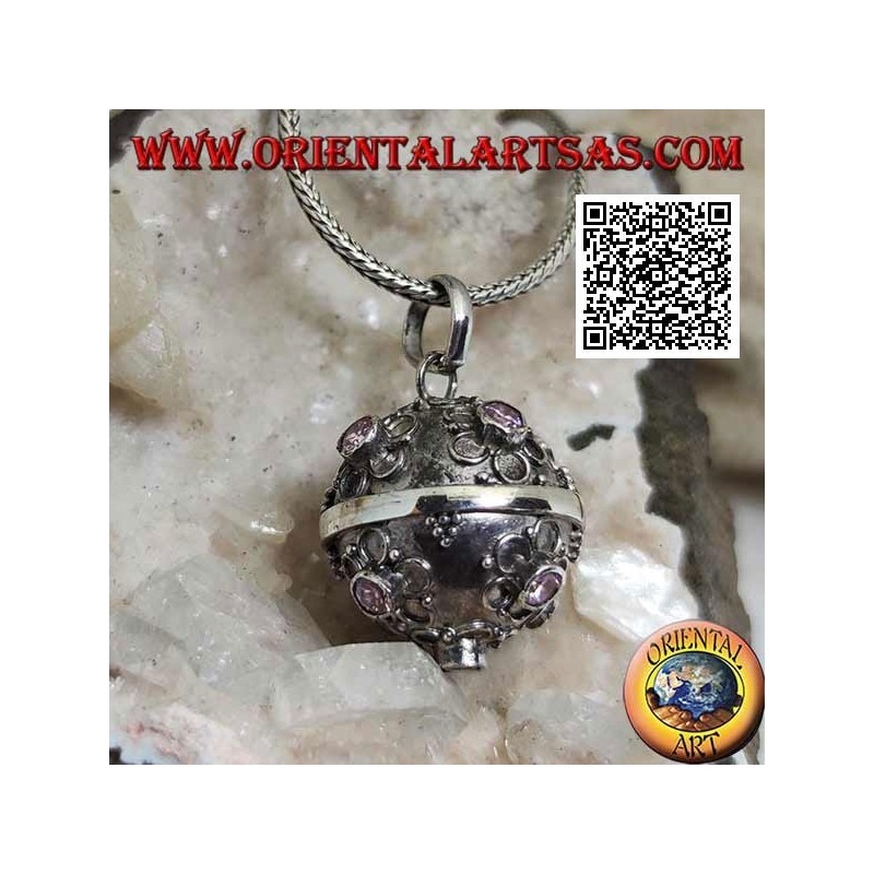 Silver pendant "Call of the Angels" with small flowers in relief and central pink zircon (Ø 20mm.)