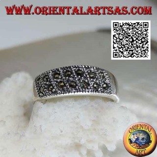 Silver band ring with rows of two oblique marcasites on the front