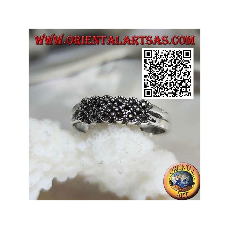 Anello in argento a fedina con tre croci di marcassite