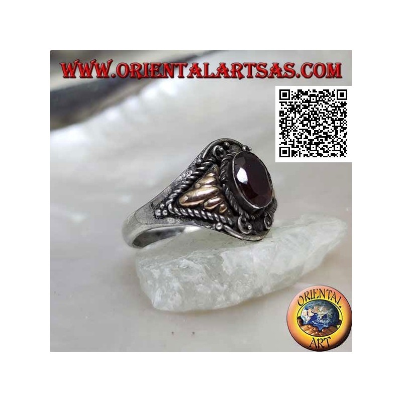 Silver ring with oval garnet and triangular cords with gold plate