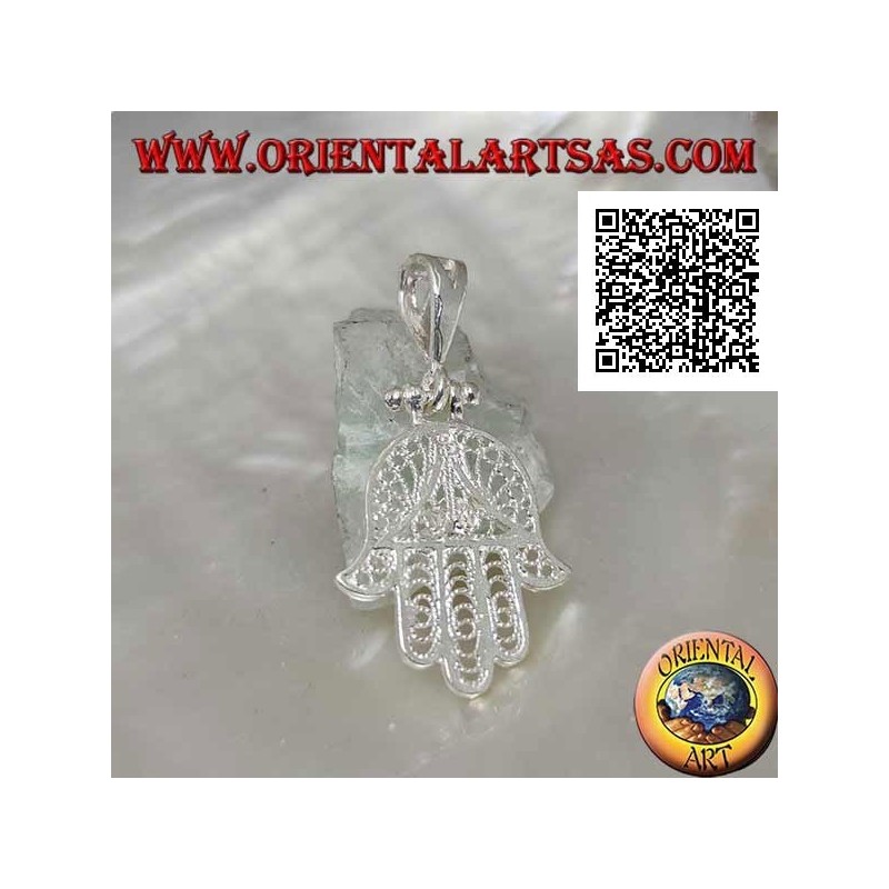 Hand of Fatima silver pendant with perforated ethnic decoration and set ruby-colored zircon