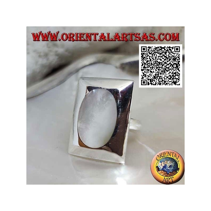 Silver ring with oval mother of pearl flush on a smooth rectangular plate