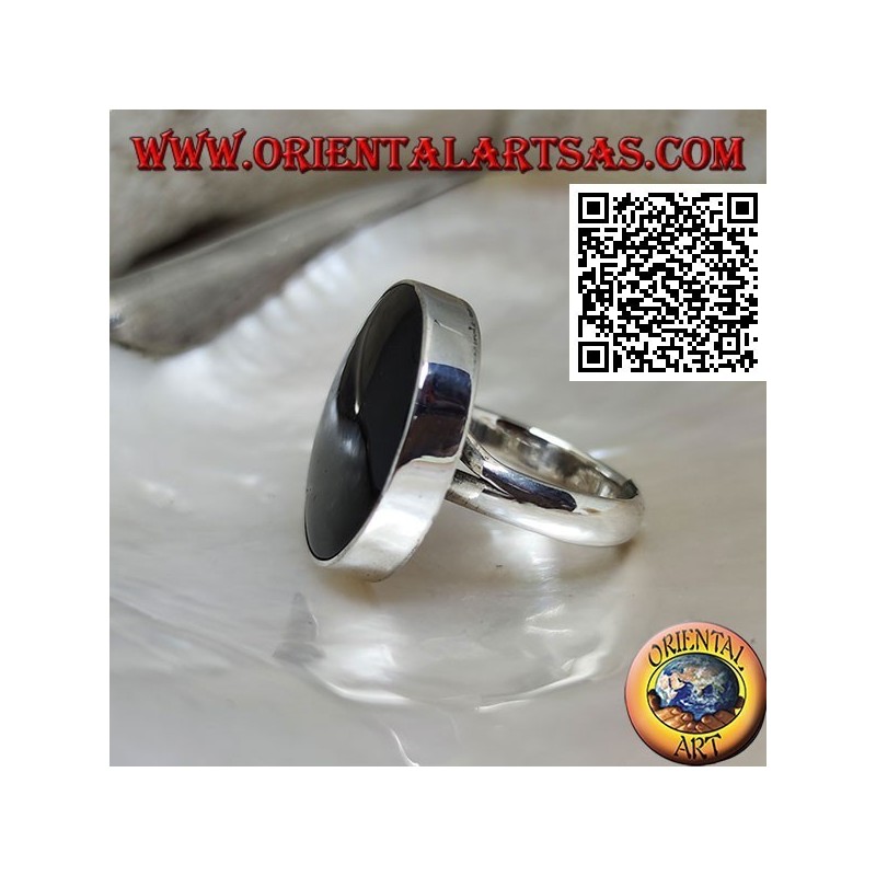 Anillo de plata con gran ónix redondo engastado con borde liso