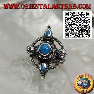 Anello in argento con croce di turchesi tondi e a goccia su cerchio 
