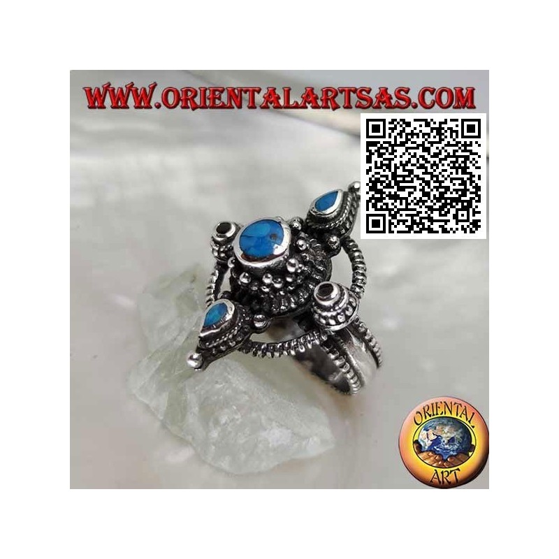 Silver ring with round and teardrop turquoise cross on a circle