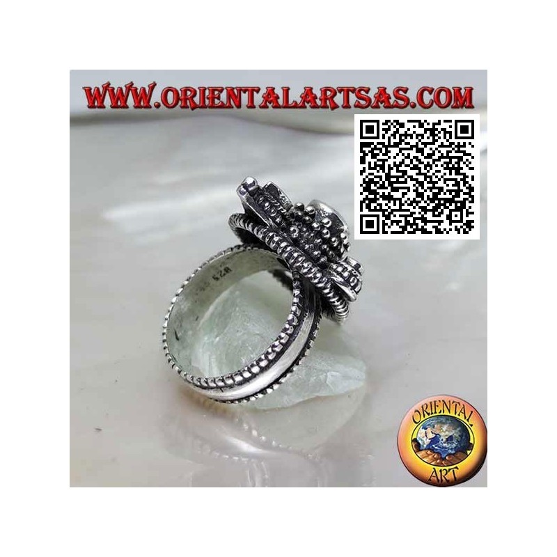 Anillo de plata con cruz turquesa redonda y lágrima en círculo