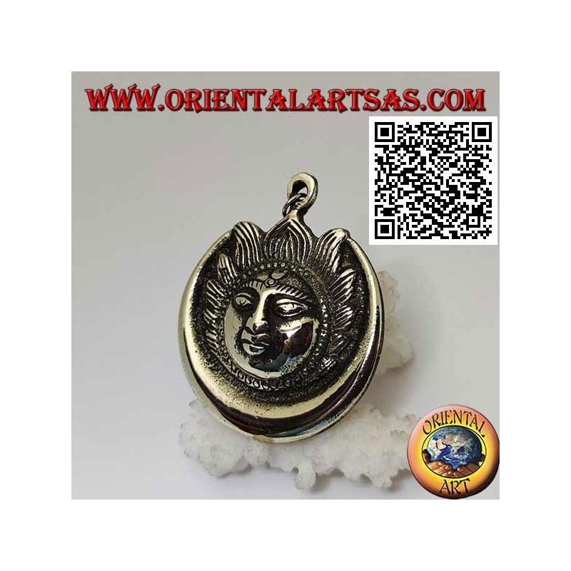 Nepalese pendant eclipse of sun and moon with face in relief in brass