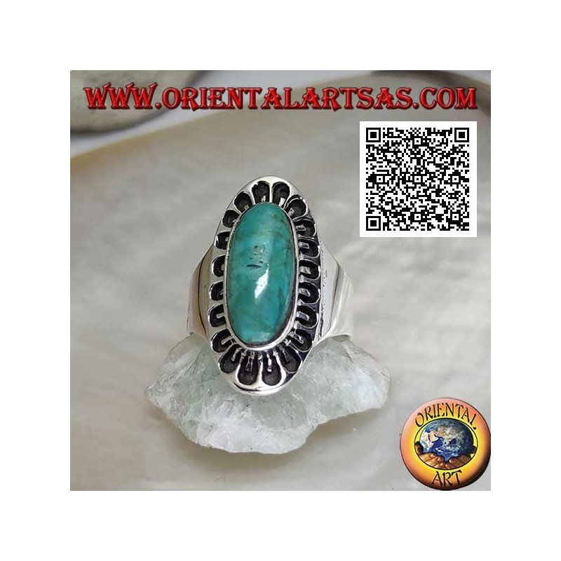 Silver ring with antique Tibetan turquoise elongated oval surrounded by engraved decoration