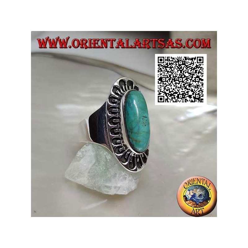 Silver ring with antique Tibetan turquoise elongated oval surrounded by engraved decoration