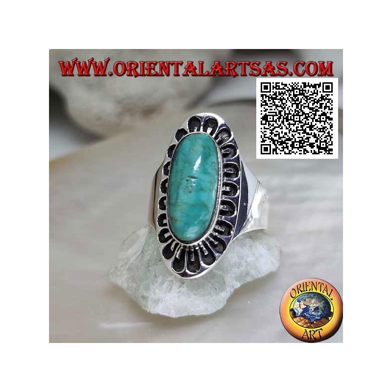 Silver ring with antique Tibetan turquoise elongated oval surrounded by engraved decoration