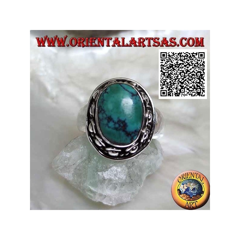 Bague en argent avec turquoise tibétaine ovale antique entourée d'entrelacs et boule dans le beignet