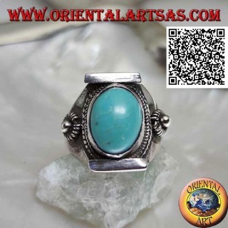 Silver ring with antique oval Tibetan turquoise in Nepalese setting with ball and discs on the sides