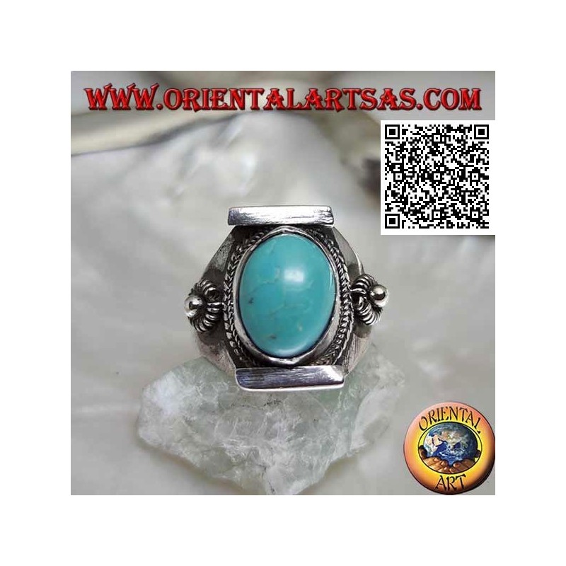 Silver ring with antique oval Tibetan turquoise in Nepalese setting with ball and discs on the sides