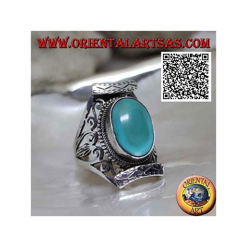 Silver ring with antique oval Tibetan turquoise in Nepalese setting with openwork on the sides