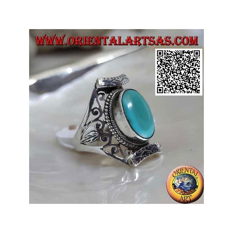 Silver ring with antique oval Tibetan turquoise in Nepalese setting with openwork on the sides