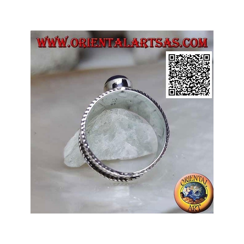 Silver band ring with oval cabochon lapis lazuli and ethnic decorations