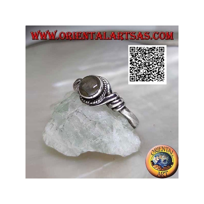Silver ring with round labradorite in the center of a coiled wire