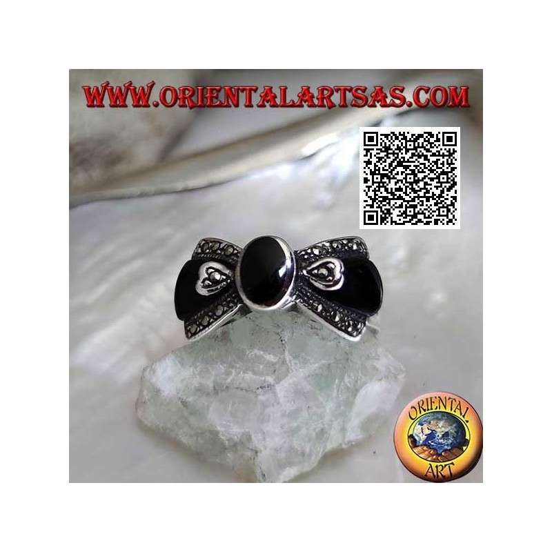 Silver bow tie ring with central oval onyx and onyx and marcssite on the sides