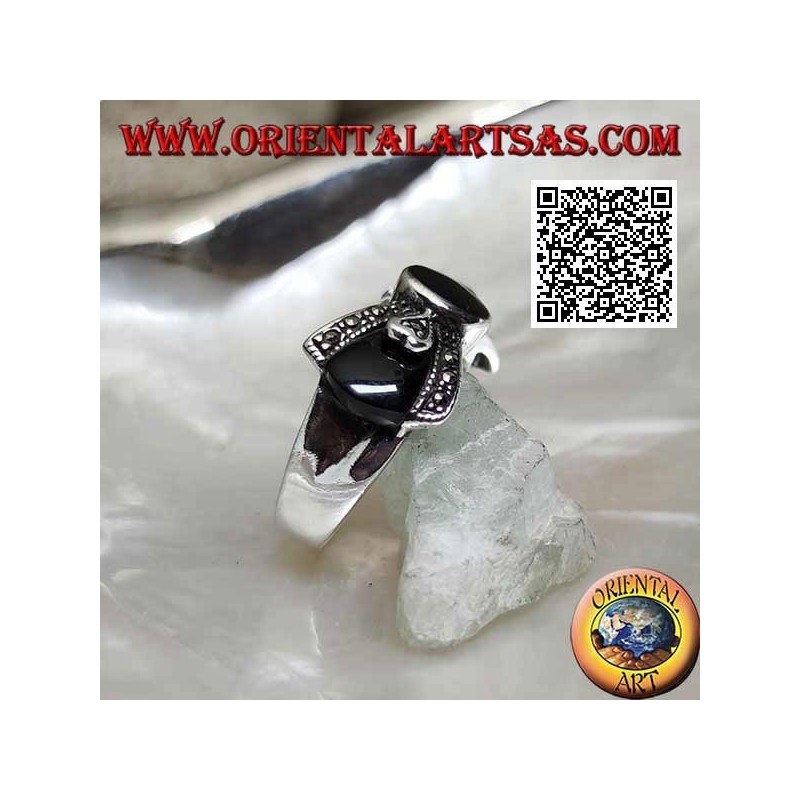 Silver bow tie ring with central oval onyx and onyx and marcssite on the sides