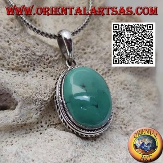 Silver pendant with antique turquoise cabochon oval surrounded by helical weave
